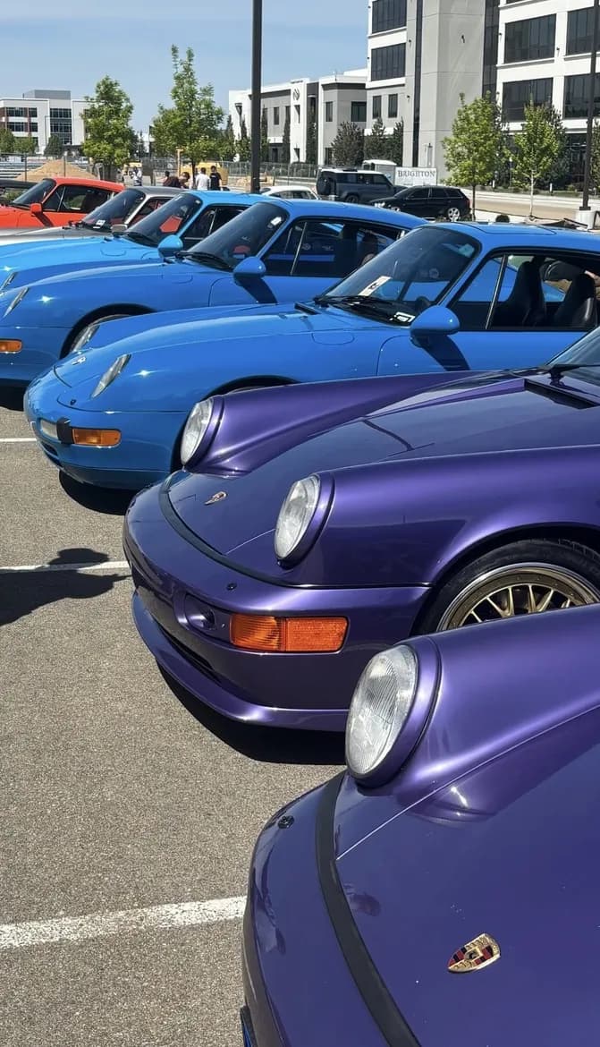 A row of air-cooled Porsche 911s lined up at Idaho Air